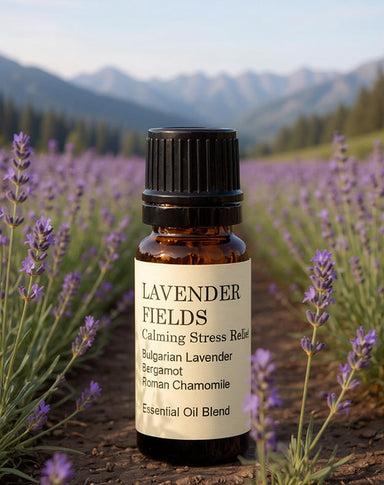 Bottle of Lavender Fields essential oil blend with a mountainous landscape in the background